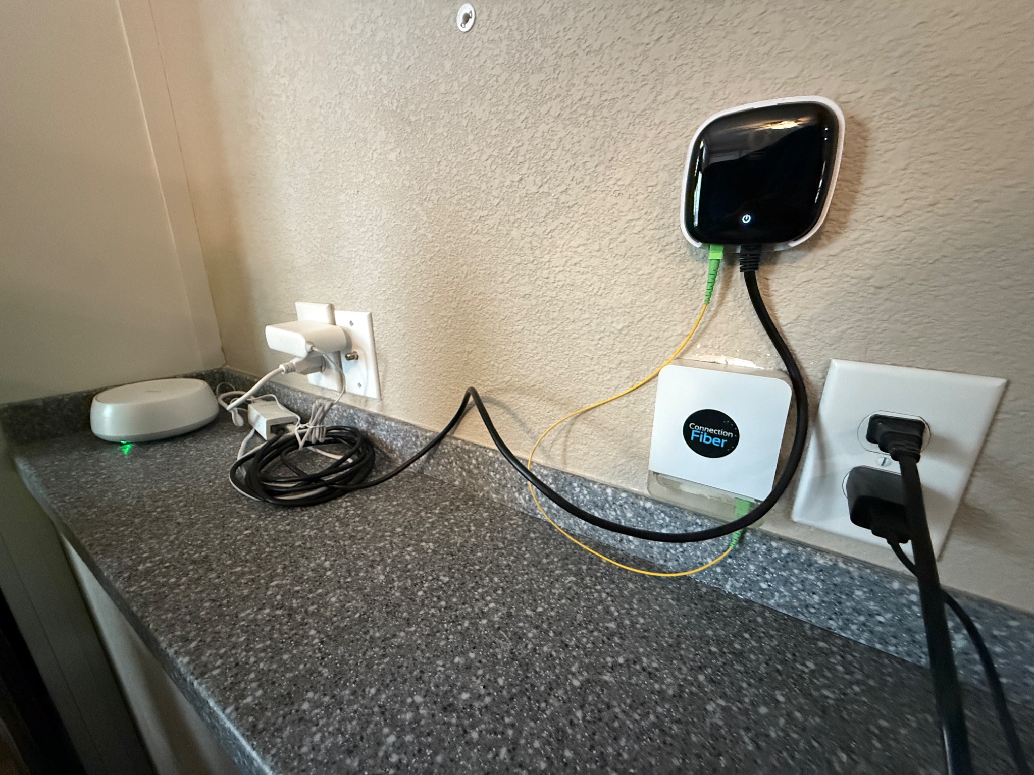 ONU installed near counter with router